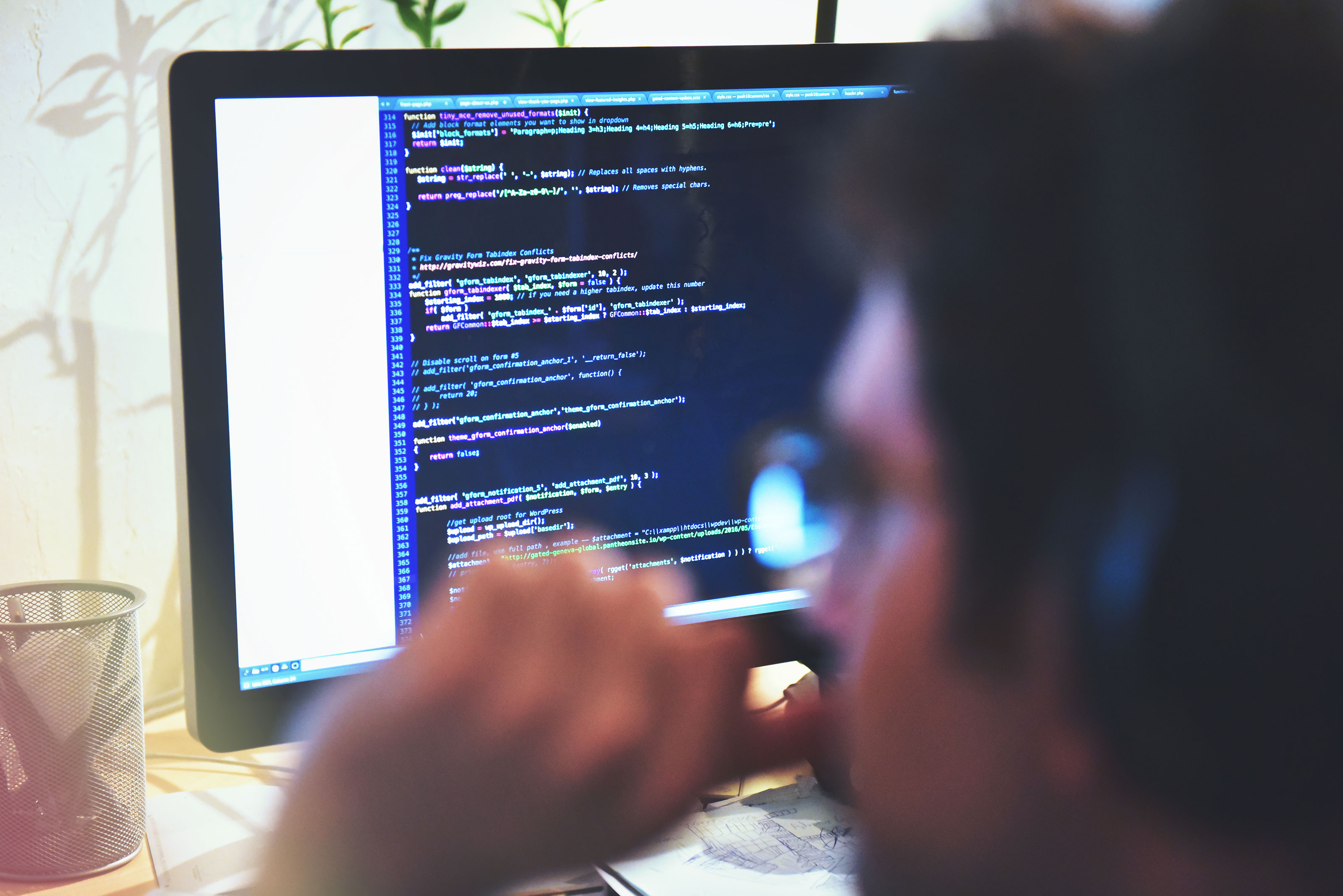 AEC web developer working on website maintenance
